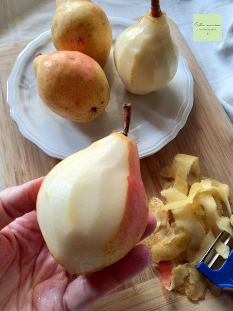 peeling the pears with a peeler