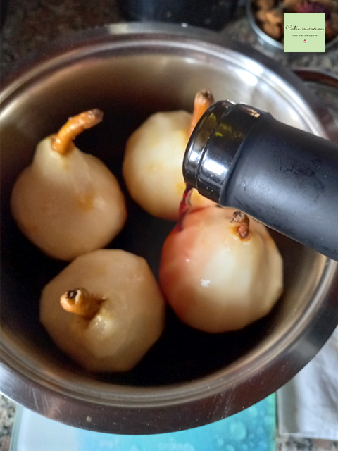 pouring the wine into the saucepan