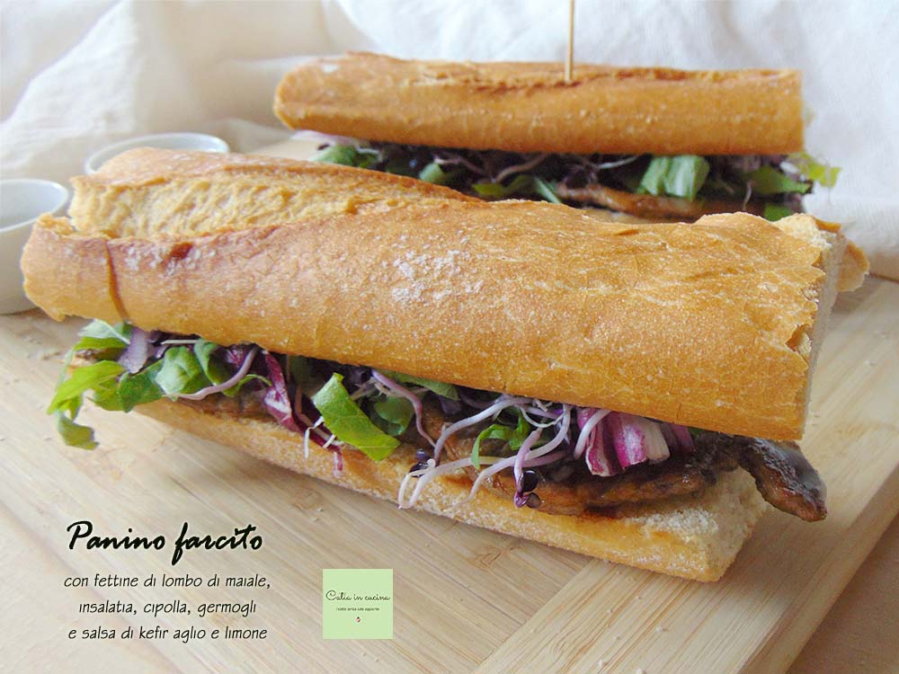 sandwich with pork loin slices and sprouts