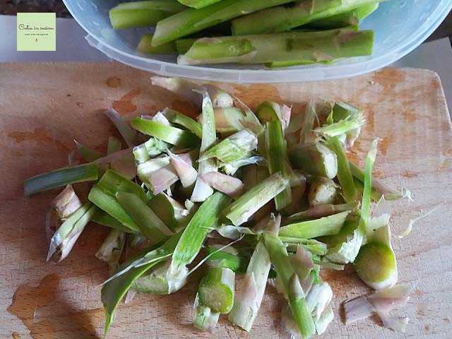 peeling asparagus stalks