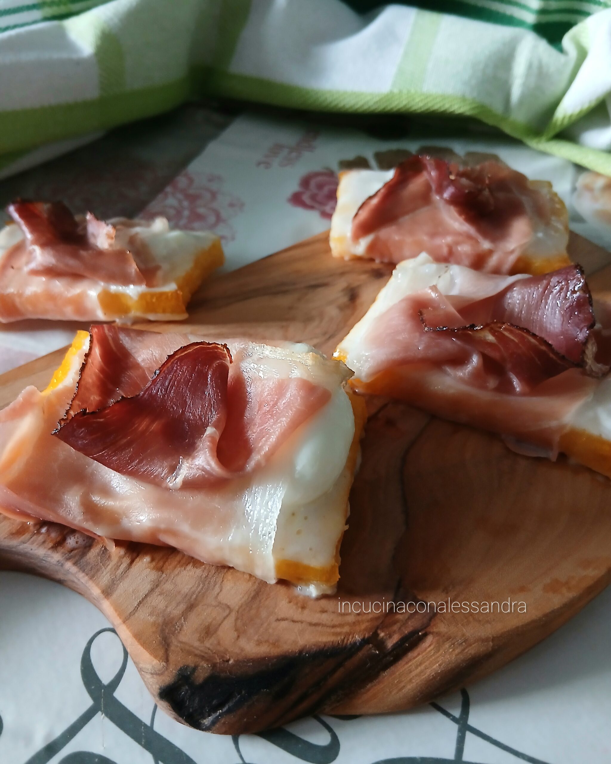 Polenta Crostini with Burrata and Prosciutto