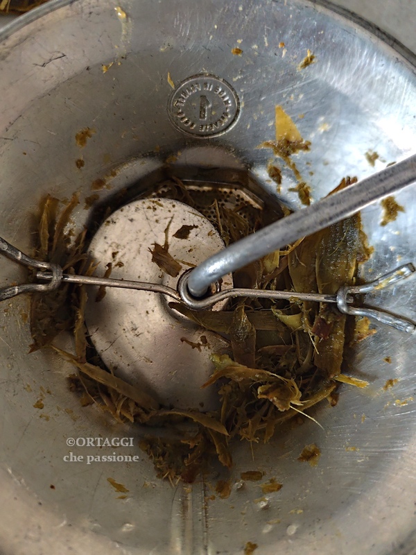 only the fibers remain in the food mill's upper basket