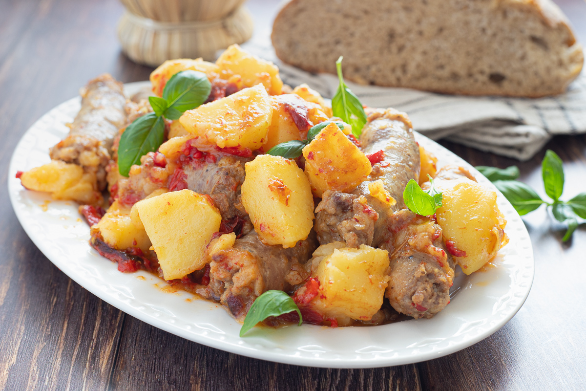 Sausage, peppers and potatoes in a skillet