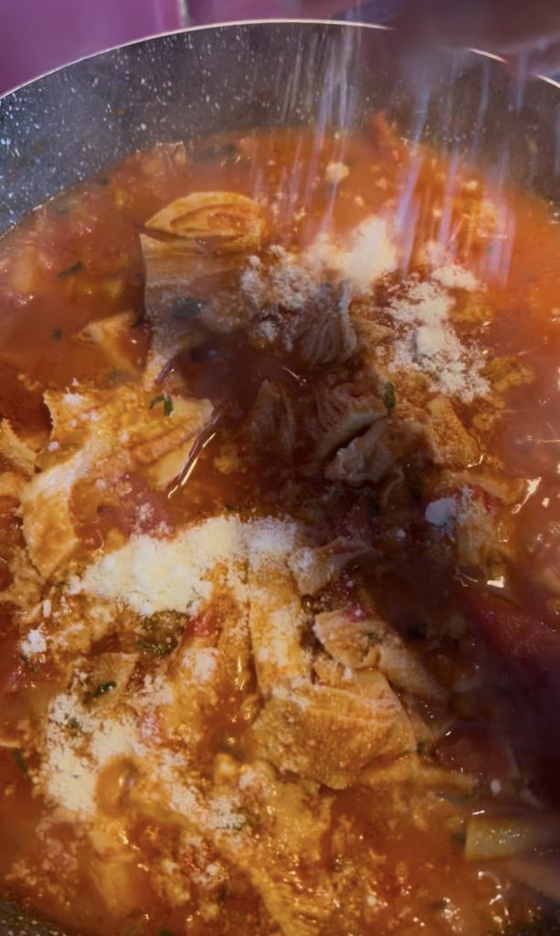 Pecorino romano added to the cooking quick Roman-style tripe