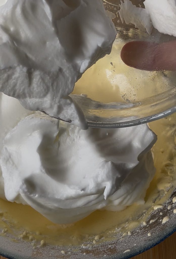 preparing soft roll batter with whipped egg whites
