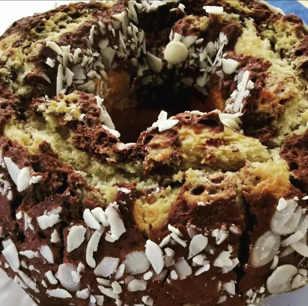 Bundt Cake with Cocoa Center and Almond Flakes