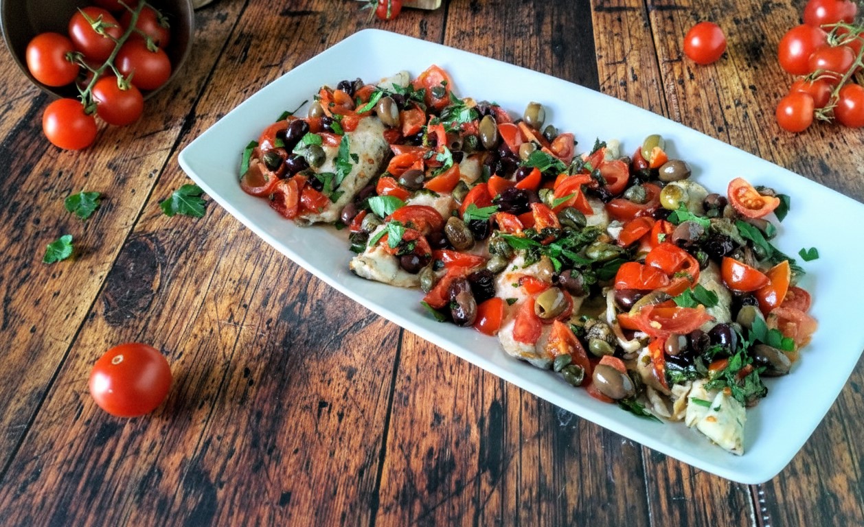 Baked Sea Bream Fillets with Cherry Tomatoes and Olives: The Fish Main Course that Tastes Like the Mediterranean