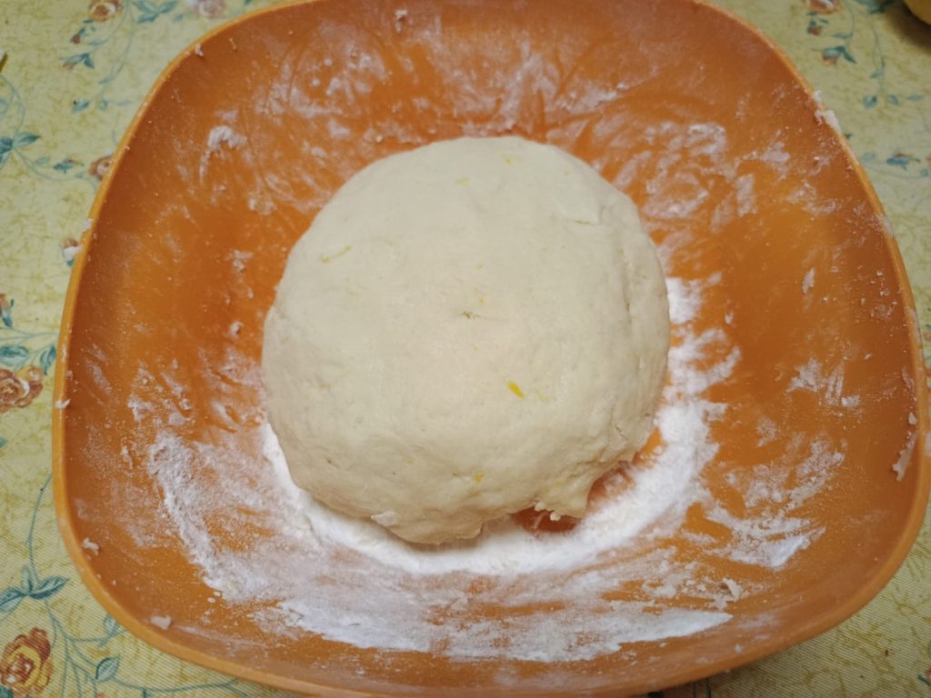 Kneading the dough until smooth and not sticky