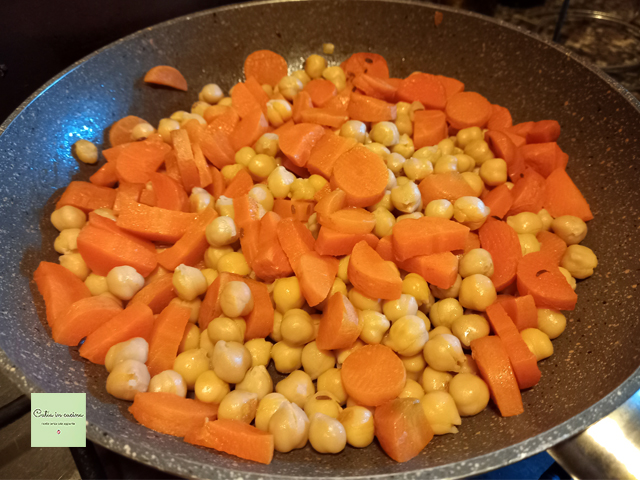chickpeas and carrots in the pan