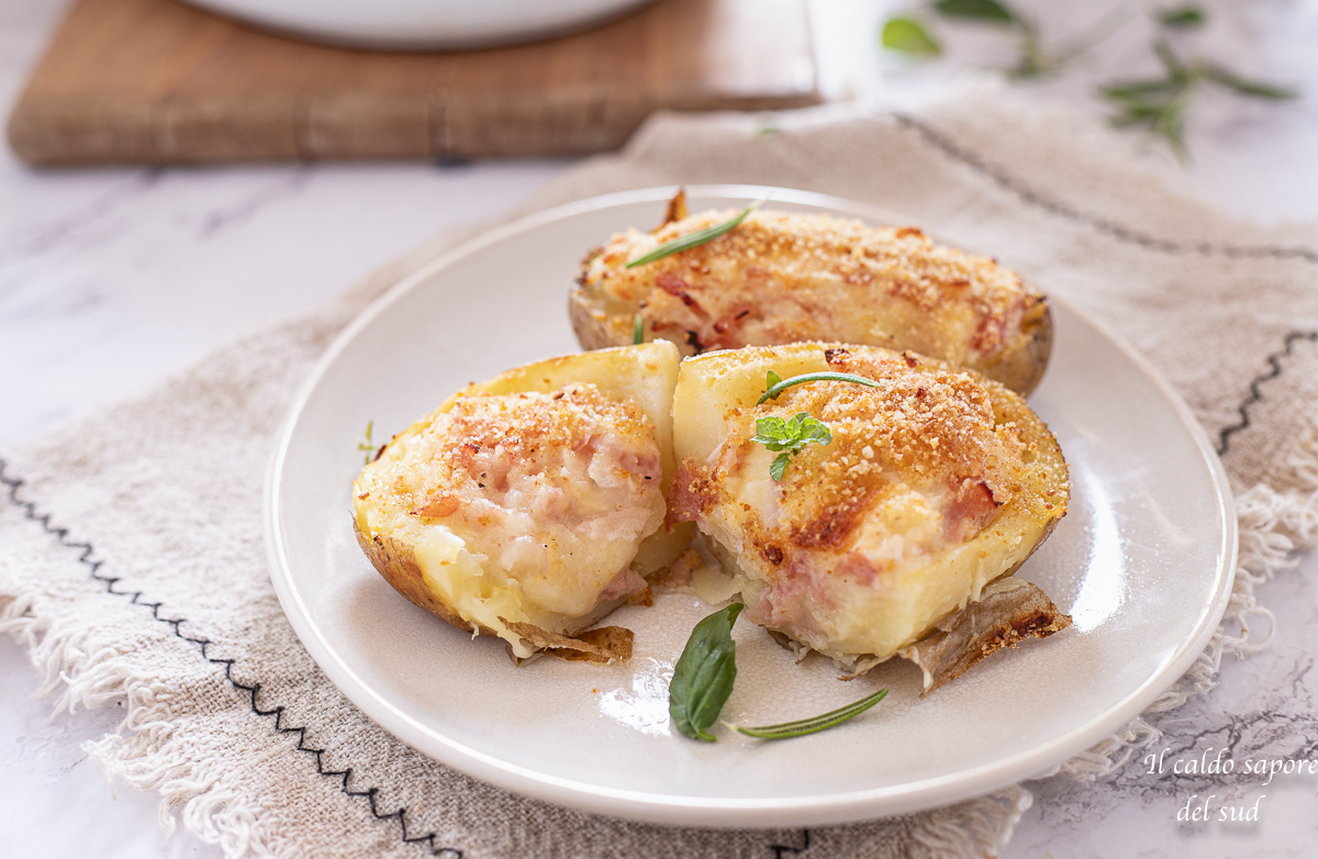 Baked stuffed potatoes with ham and provola