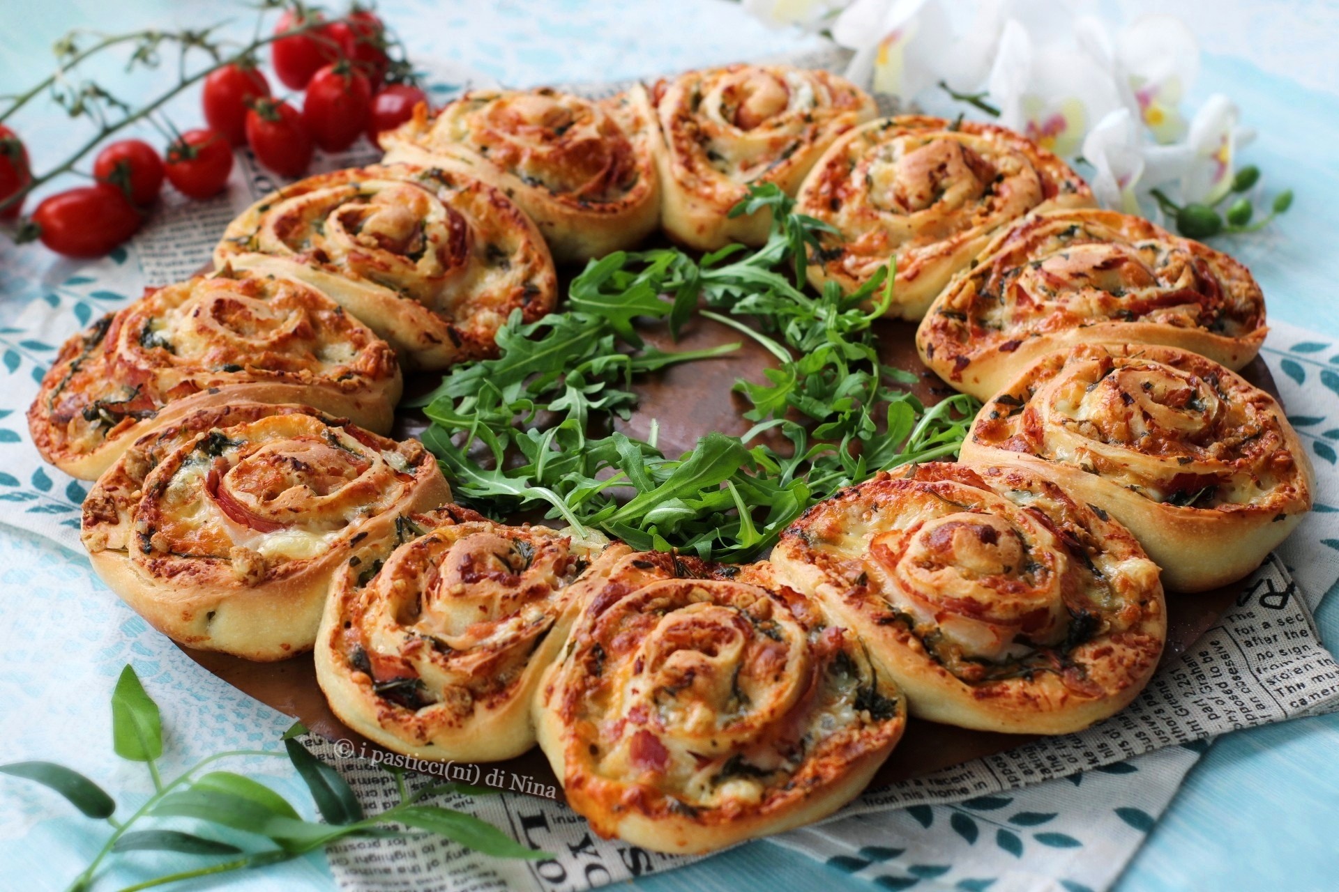 CROWN OF PINWHEELS FILLED WITH HAM AND ARUGULA