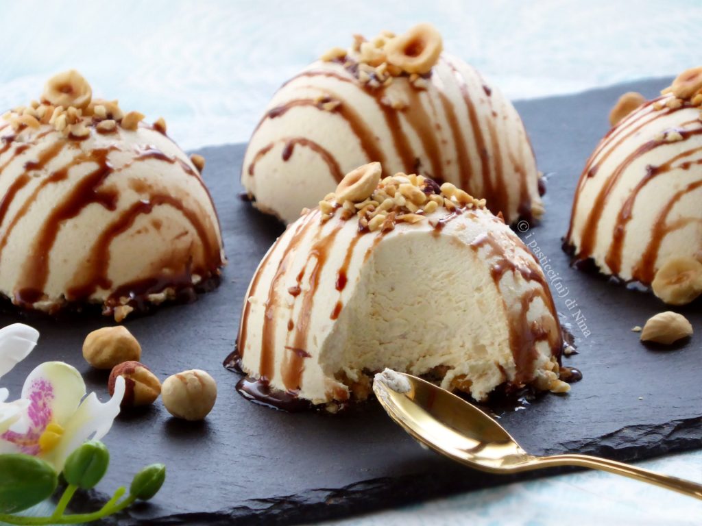 Half-spheres of hazelnut semifreddo with caramel with homemade topping recipe i pasticcini di Nina