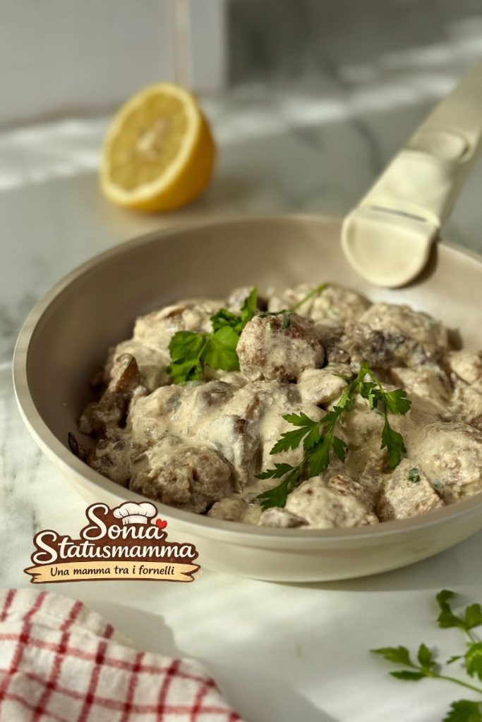 Plate of creamy sausage and Pleurotus mushroom meatballs without cream with parsley.
