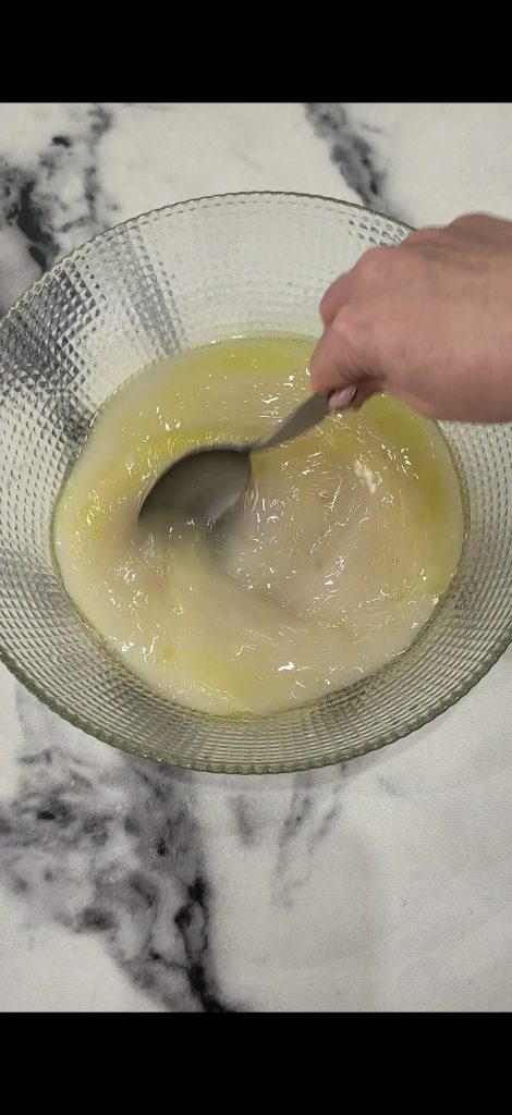 Dissolve the yeast in water and oil