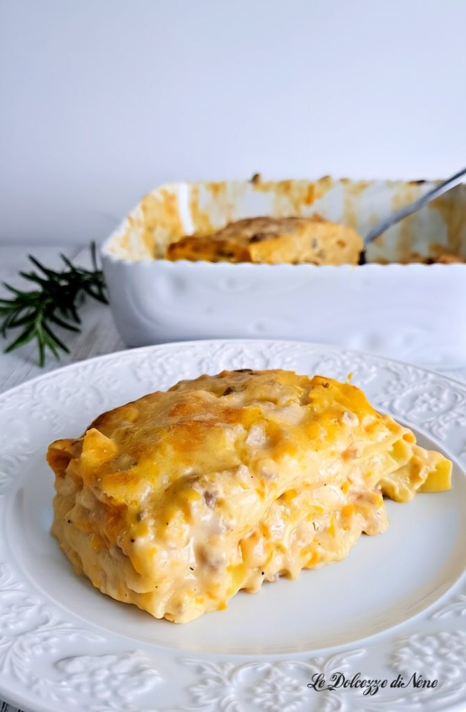 Baked lasagna with pumpkin, sausage and scamorza