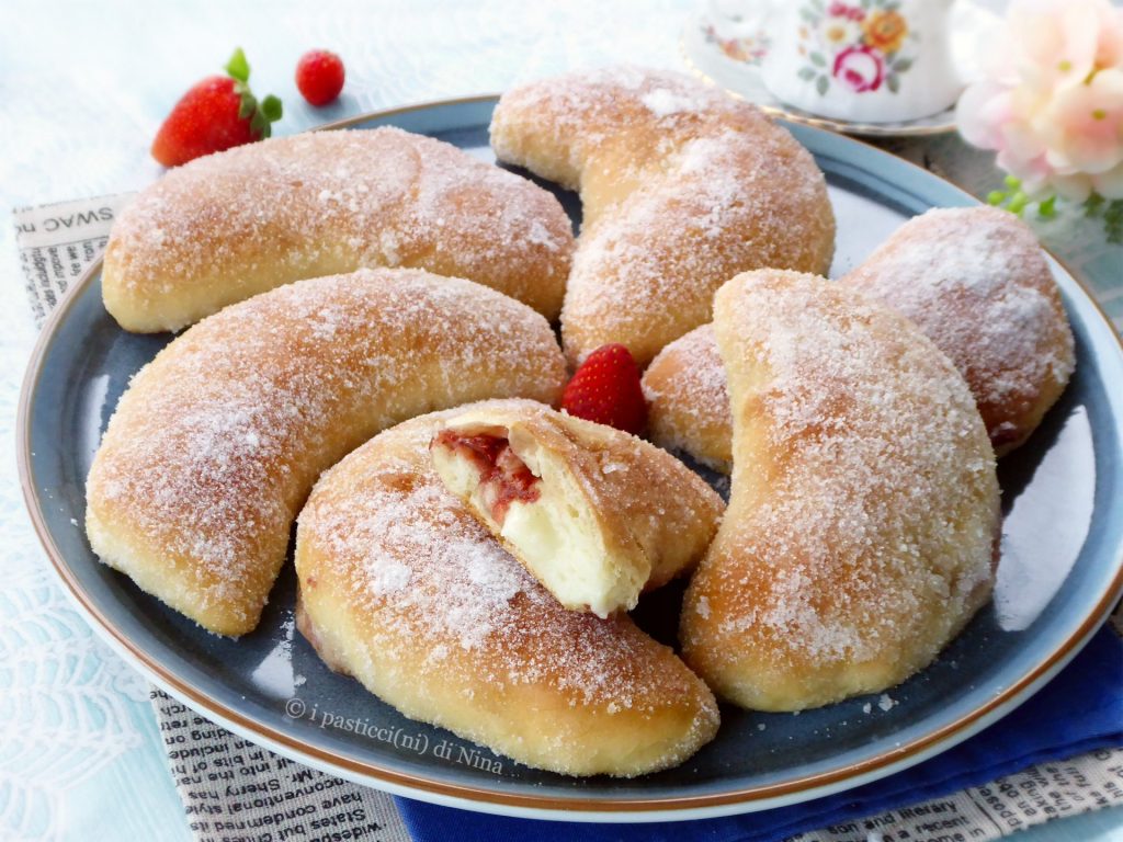 Half-moon brioche with milk cream and jam soft leavened sweets baked recipe i pasticcini di Nina
