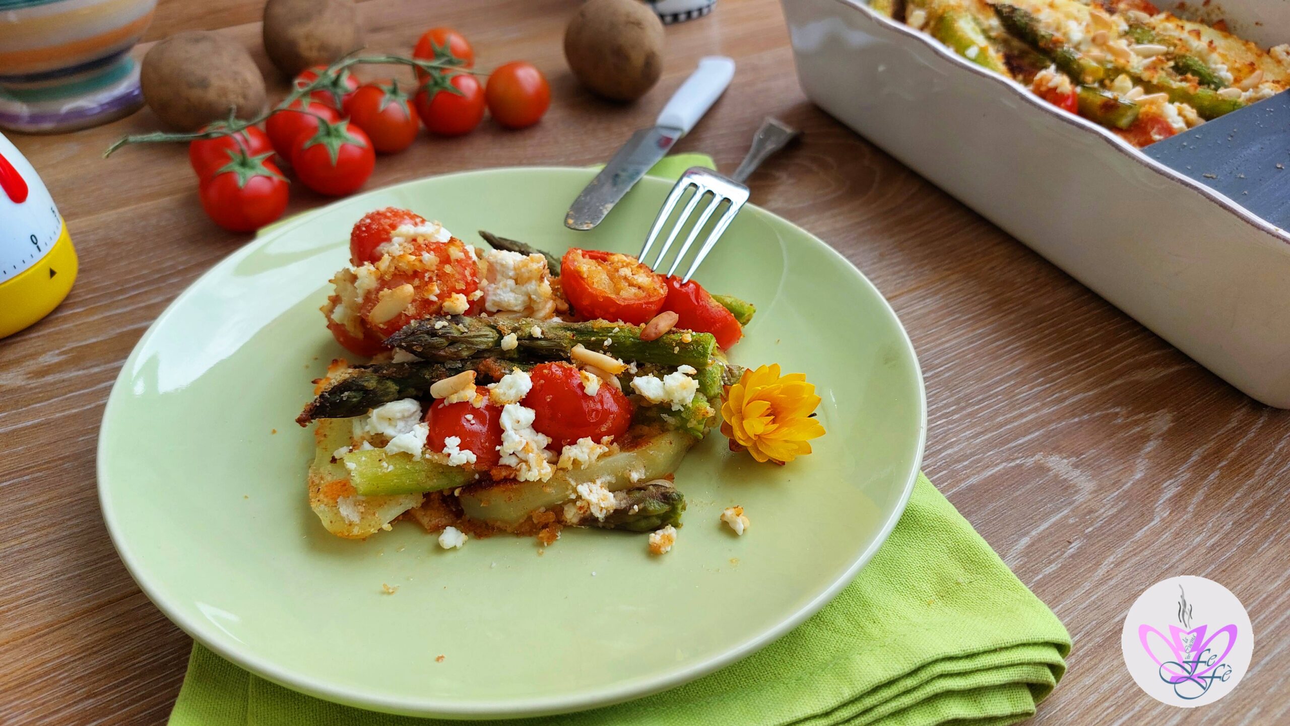 ASPARAGUS, POTATOES AND CHERRY TOMATOES BAKED WITH FETA AND PINE NUTS