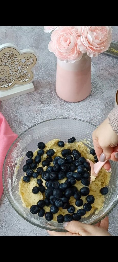 Add blueberries to the batter