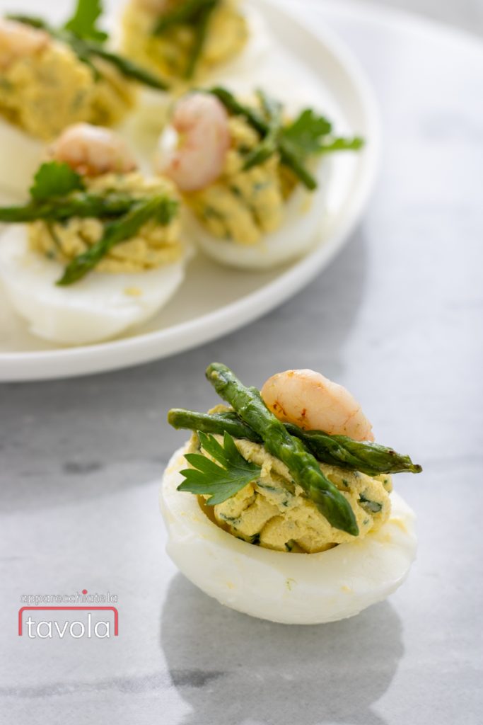 appetizer hard-boiled eggs with asparagus and shrimp