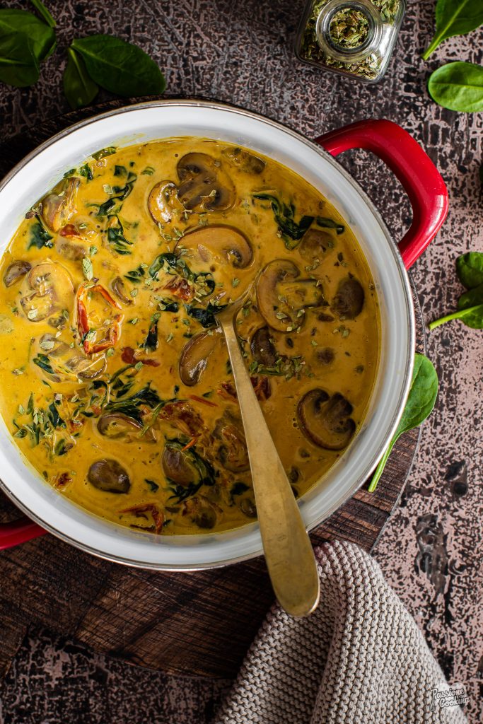 Champignon mushrooms in sauce