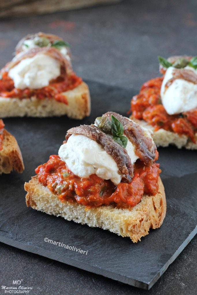 Crostini with roasted pepper cream, ricotta and anchovies