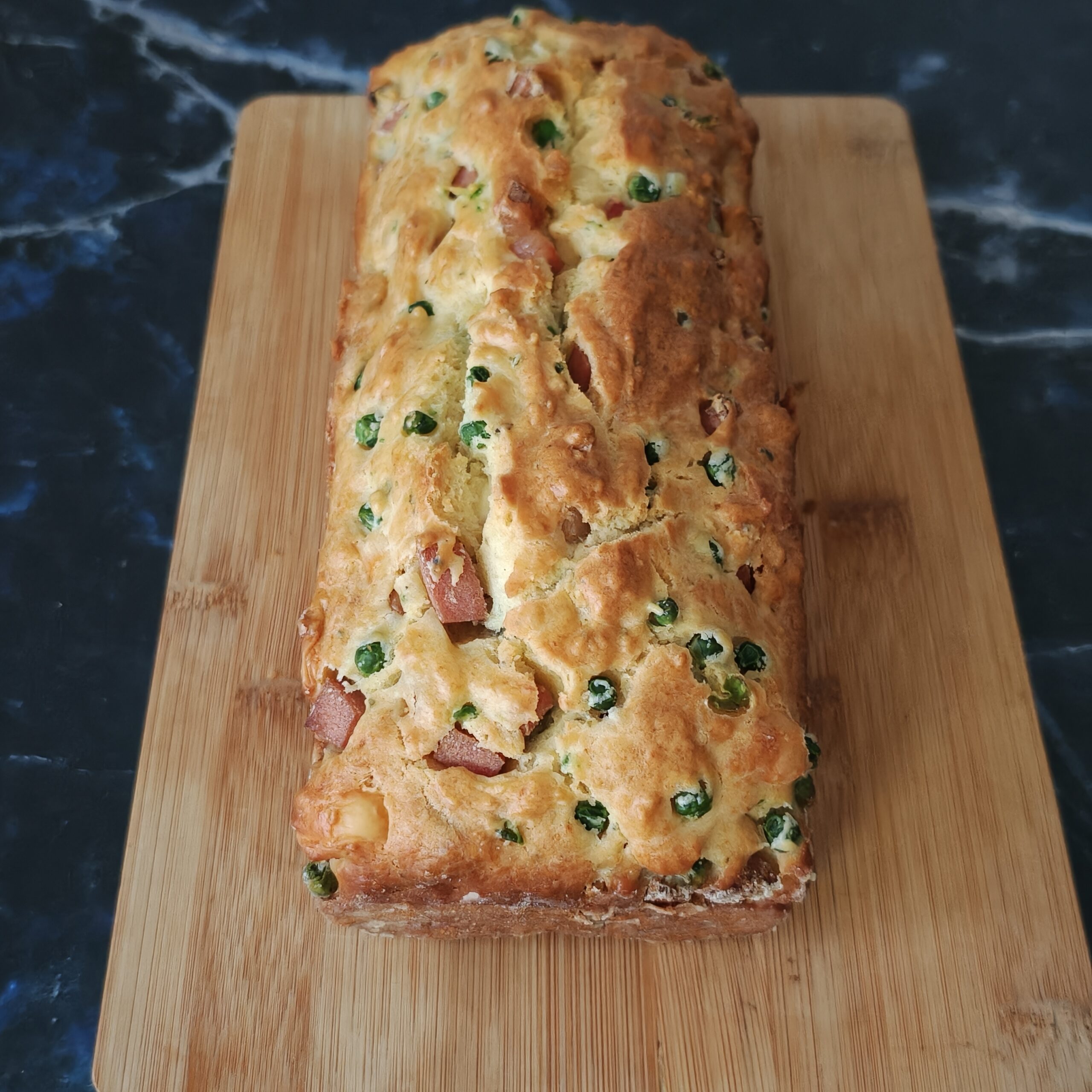 Savory Plumcake with Peas and Mortadella: soft, quick and fridge-cleaner