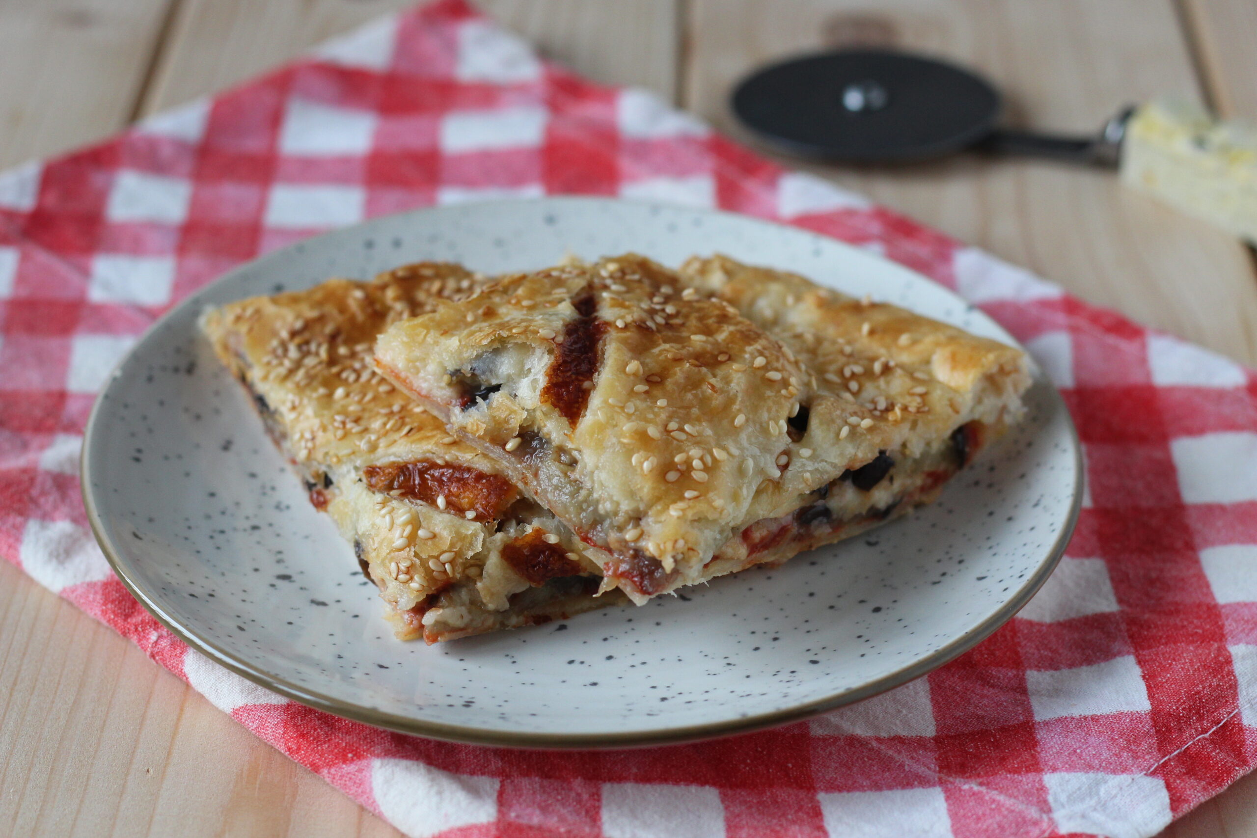 Rustic puff pastry with grilled eggplant, tomato and mozzarella