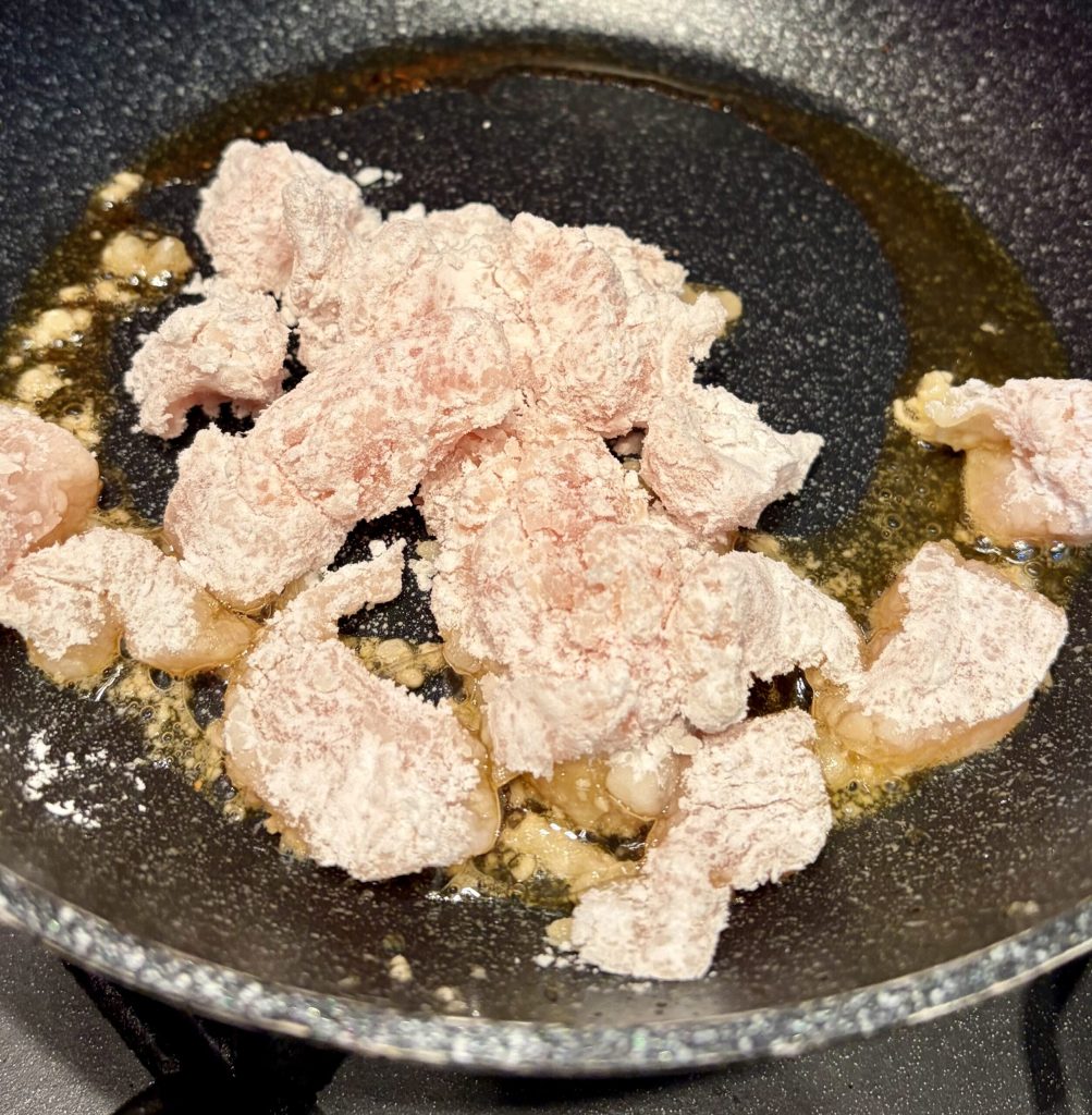 chicken floured with potato starch cooking