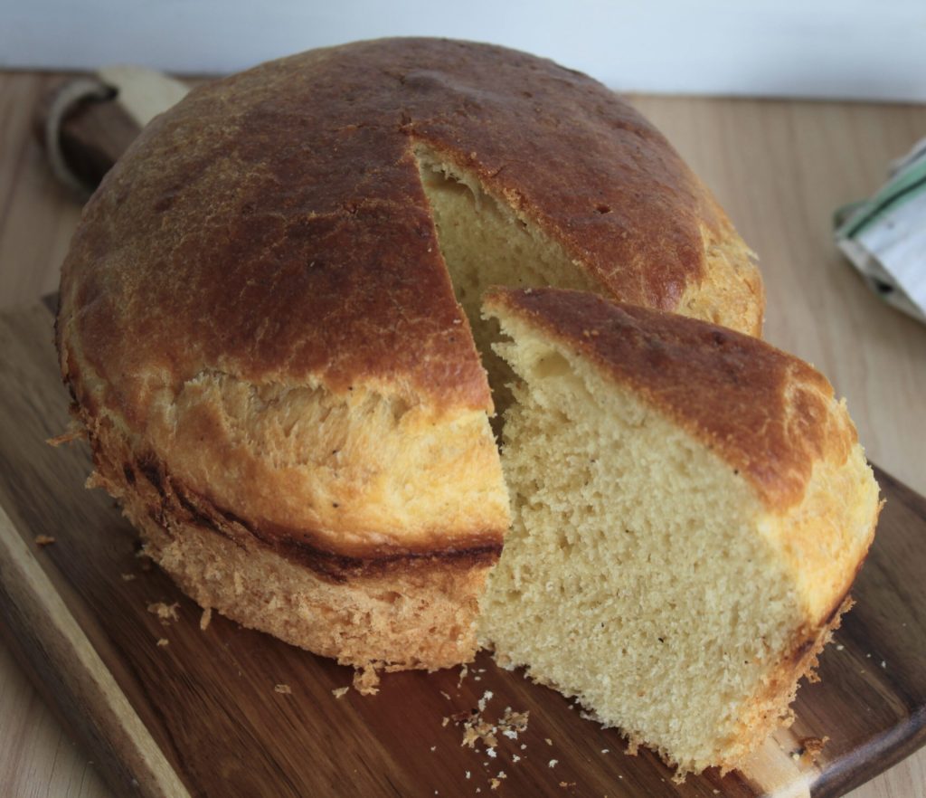 tall and fluffy Easter cheese pizza, sliced