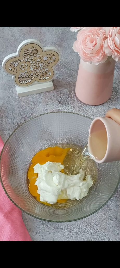 Mix eggs, vegetable oil and Greek yogurt