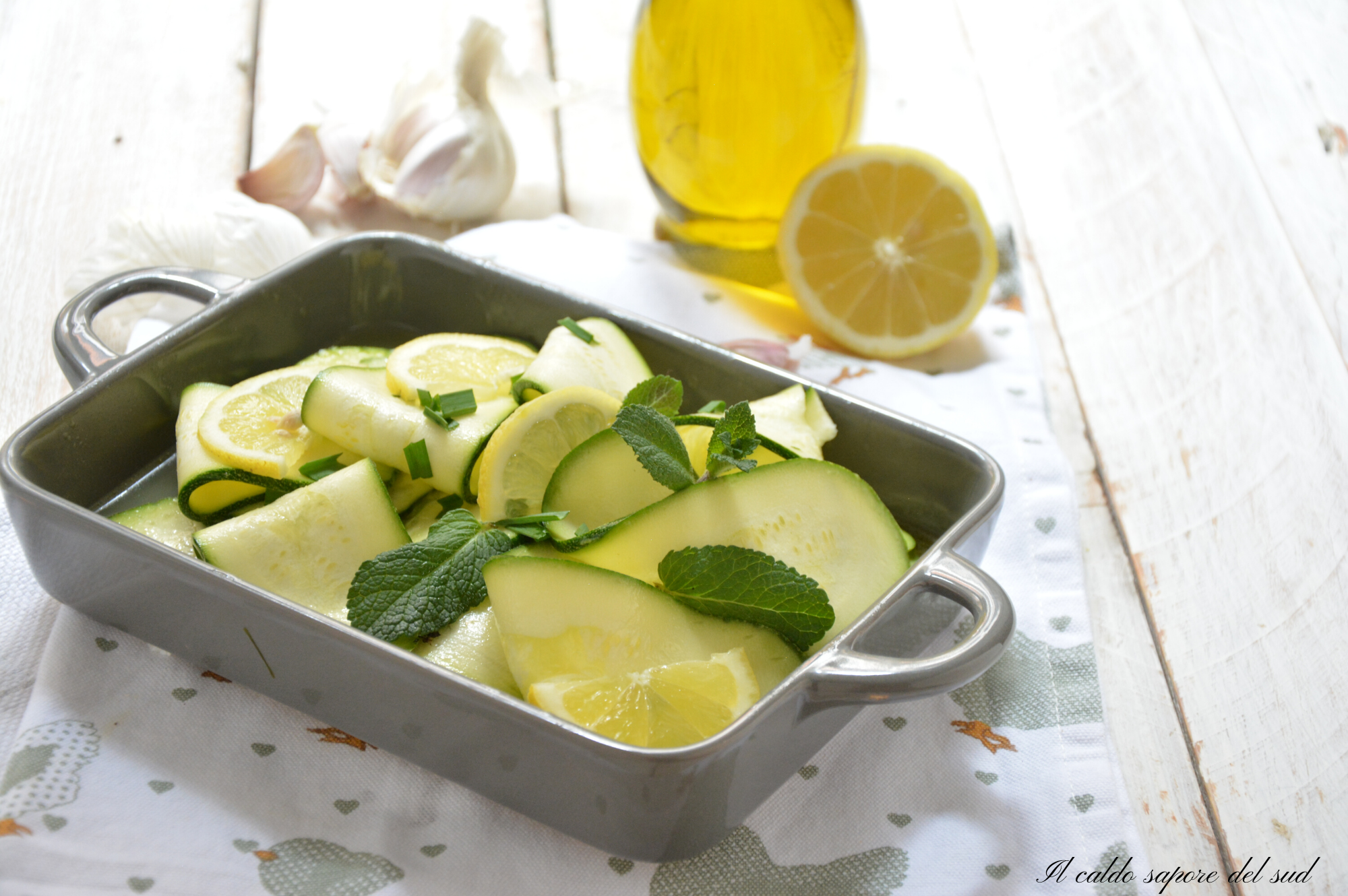 Raw marinated zucchini with lemon