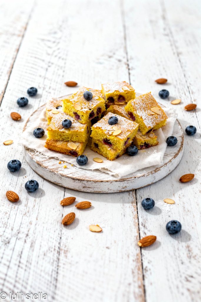 soft and gluten-free almond and blueberry cake seen from above