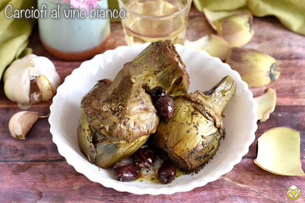 artichokes stewed in white wine in a pan braised whole artichokes with olives il chicco di mais