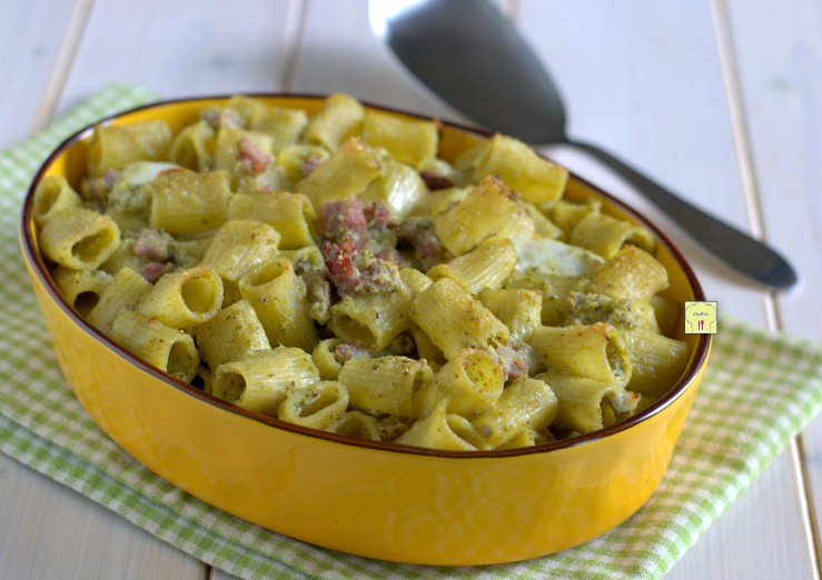 Baked pasta with pesto, ricotta and speck
