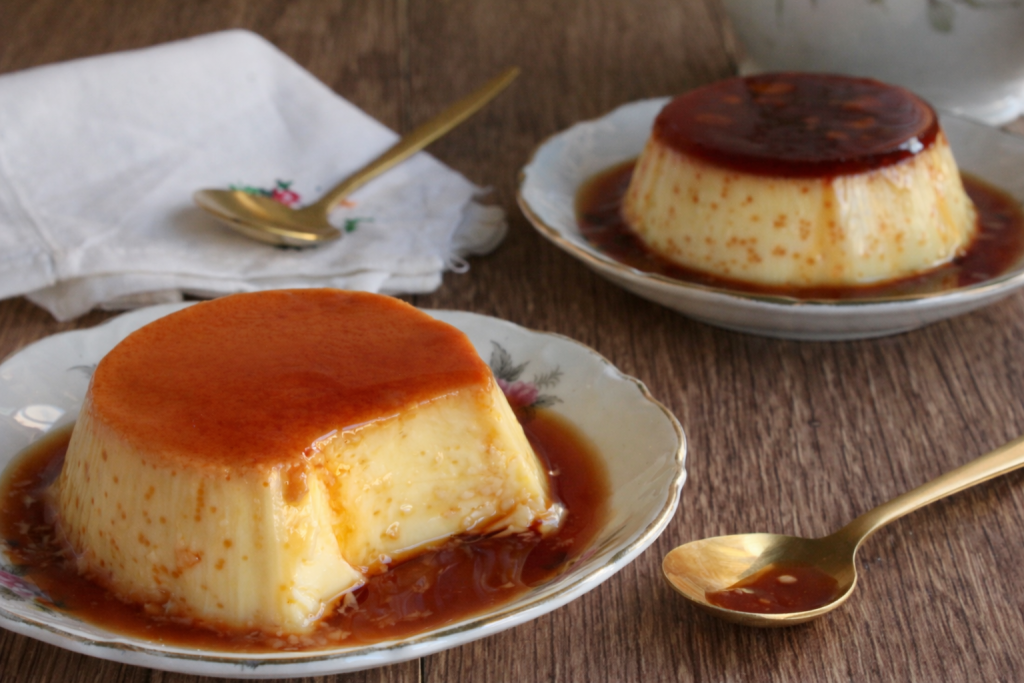 Creamy homemade crème caramel with liquid caramel and teaspoon