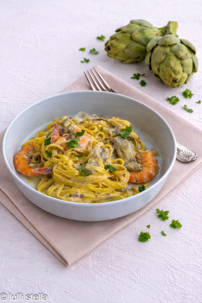 delicious gluten-free tagliatelle with artichokes and shrimp