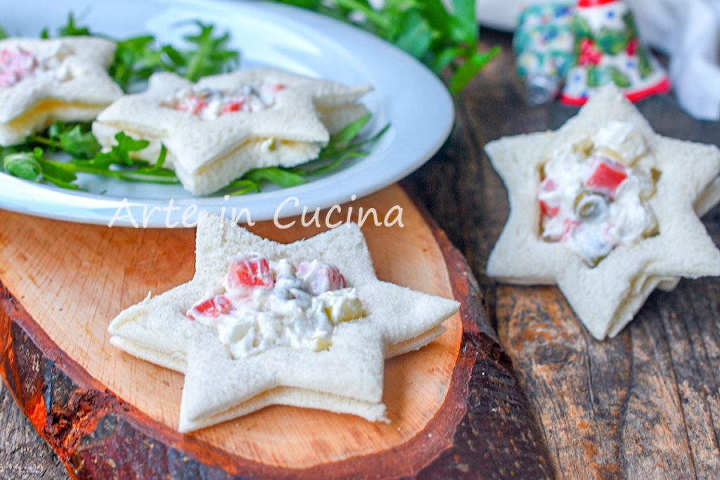 Canapés mit russischem Salat in Sternform Weihnachtliche Vorspeise