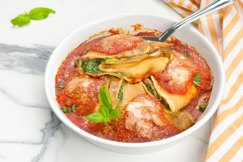 Rezept Crêpes mit Ricotta und Spinat in Tomatensauce