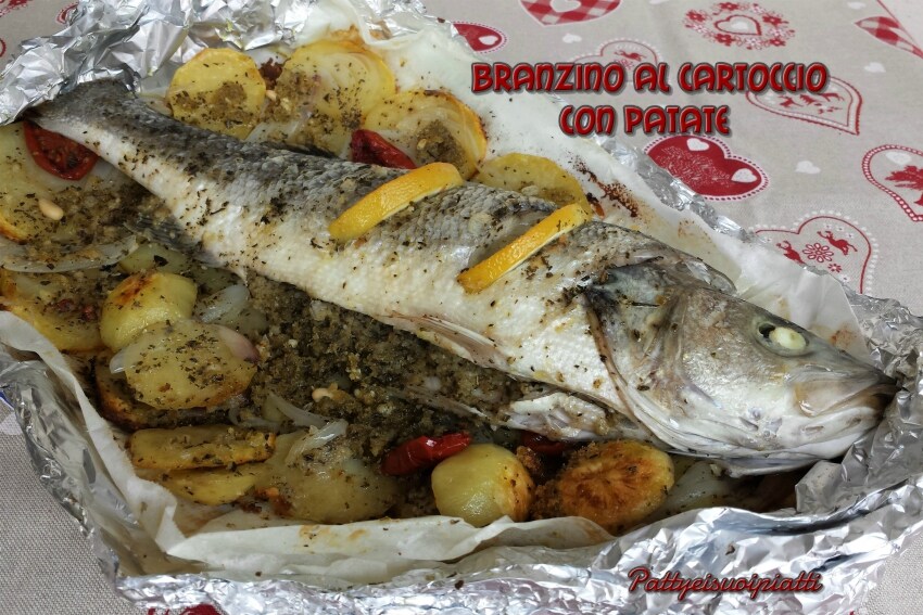 wolfsbarsch in folie mit kartoffeln