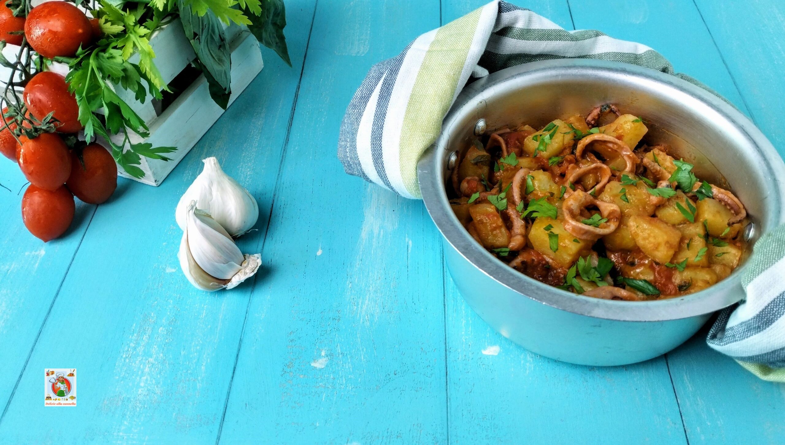 Tintenfisch und Kartoffeln in Sauce: das traditionelle Meeresfrüchte-Hauptgericht mit unverkennbarem Geschmack