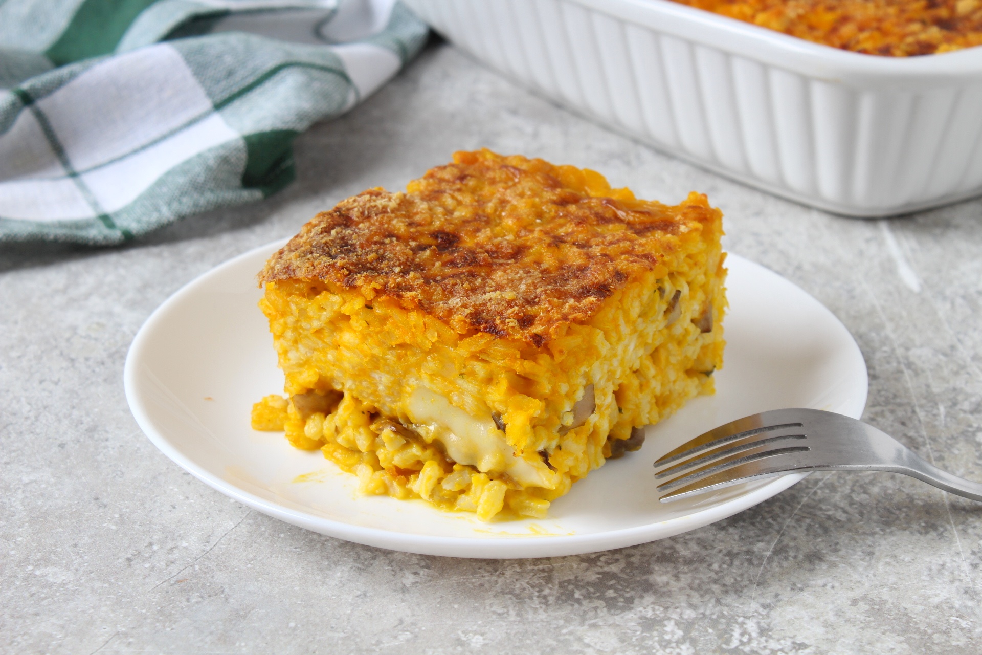 Reisauflauf mit Kürbis, Pilzen und Taleggio