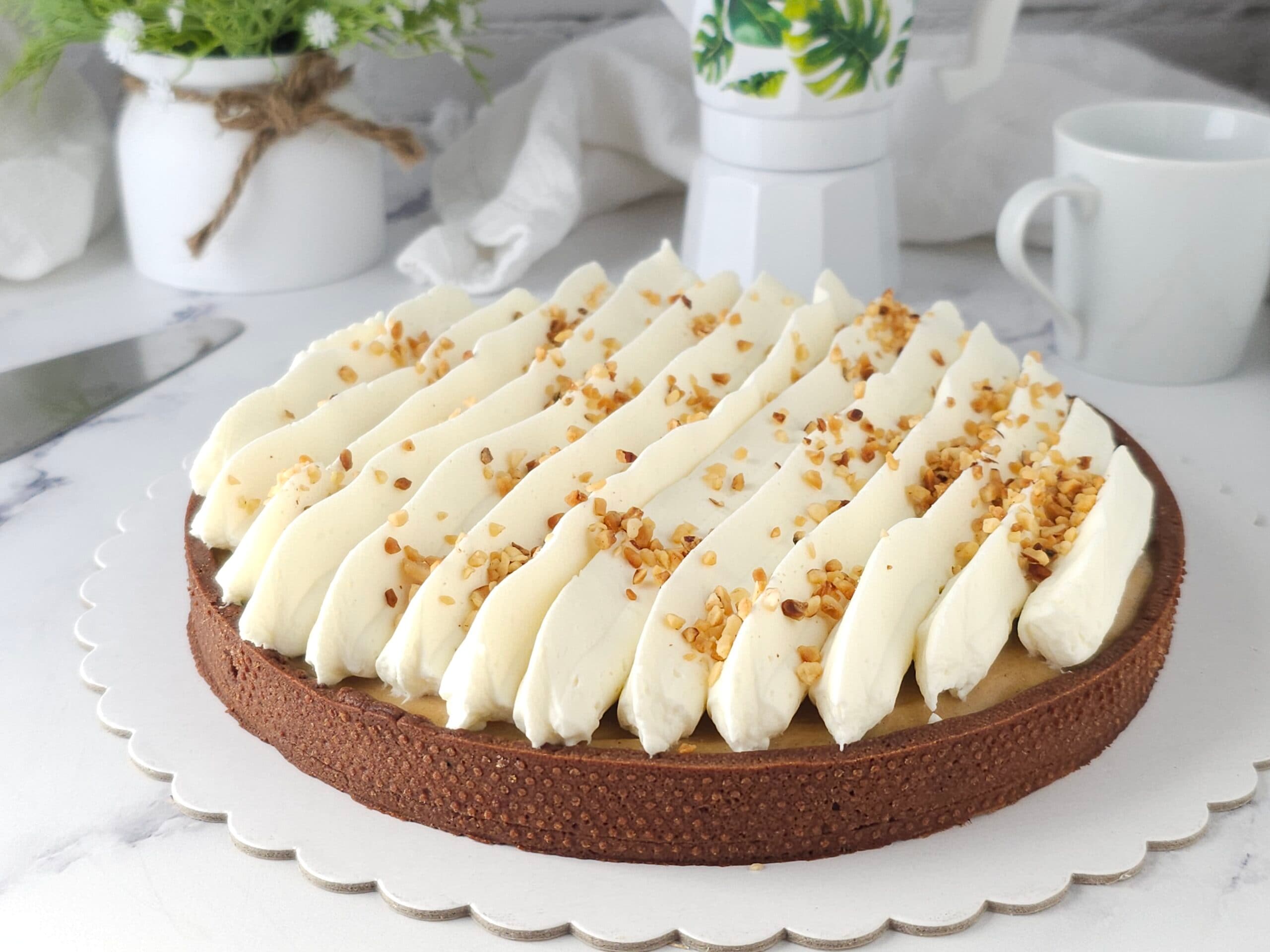 Tarte mit Haselnussmousse und aufgeschlagener Panna Cotta