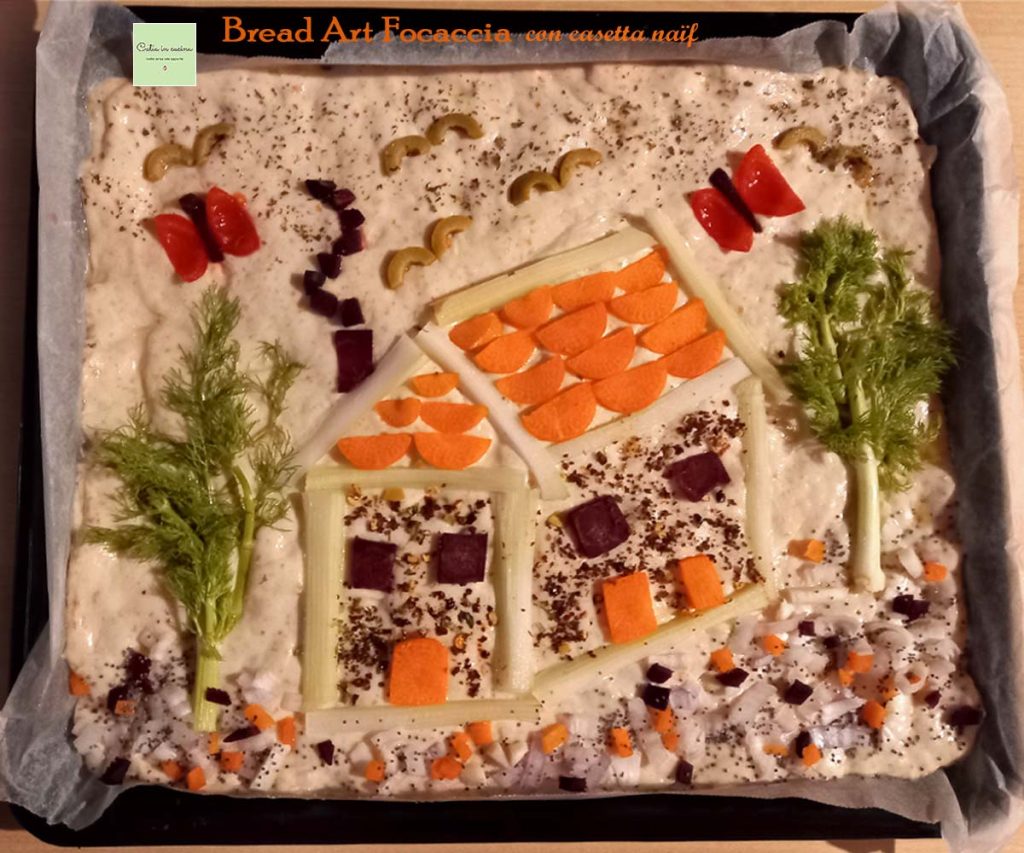 bread art focaccia mit Hütte zum Backen