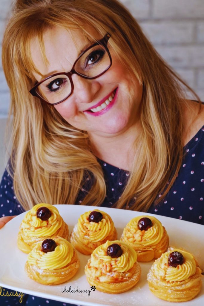 San Giuseppe Krapfen mit Vanillecreme und Amarenen auf weißem Tablett, hausgemacht von idolcidisusy