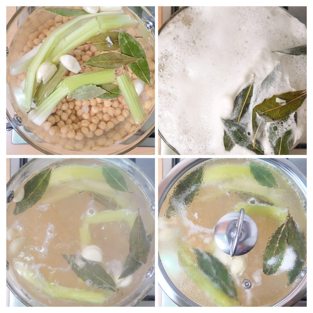 Kichererbsen im Topf mit Lorbeer, Knoblauch und Sellerie bereit zum Kochen
