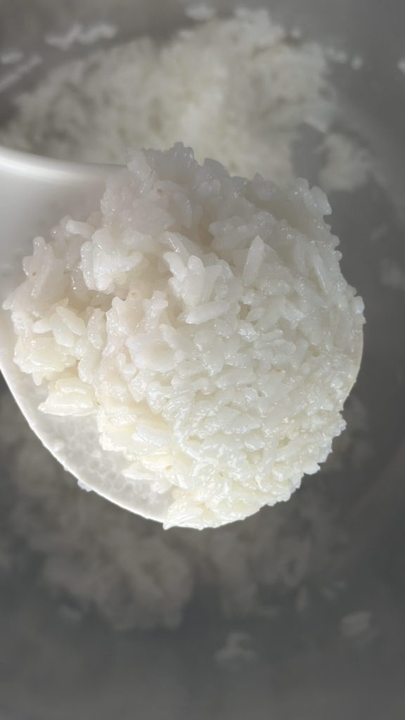 Würzmischung mit dem Reis vermengen