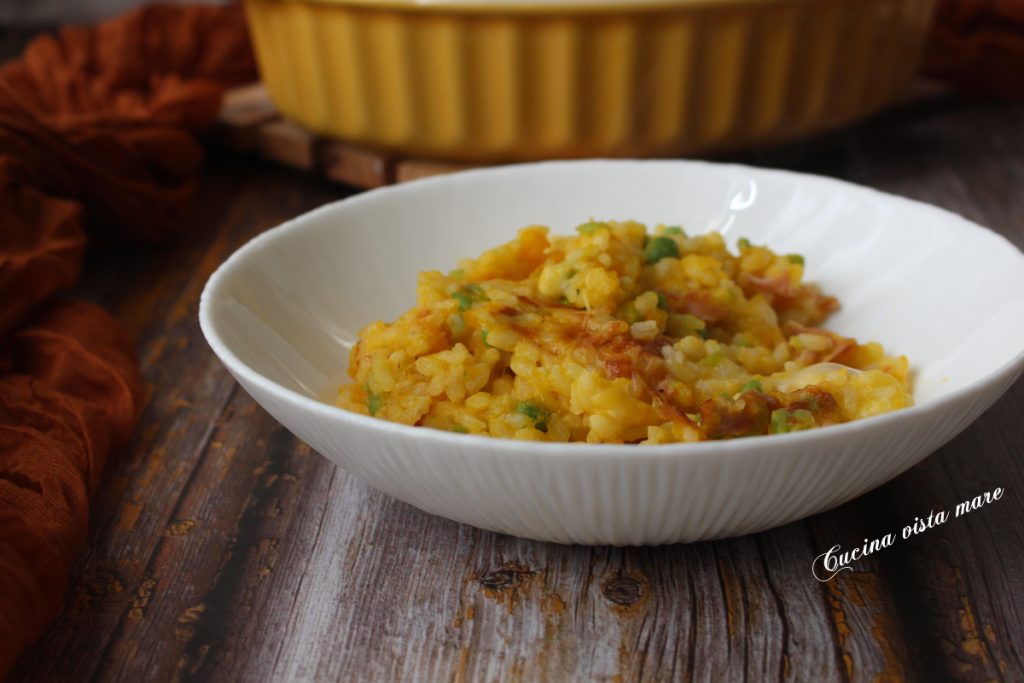 Überbackener Reis mit Kürbis, Speck und Erbsen - Cucina vista mare