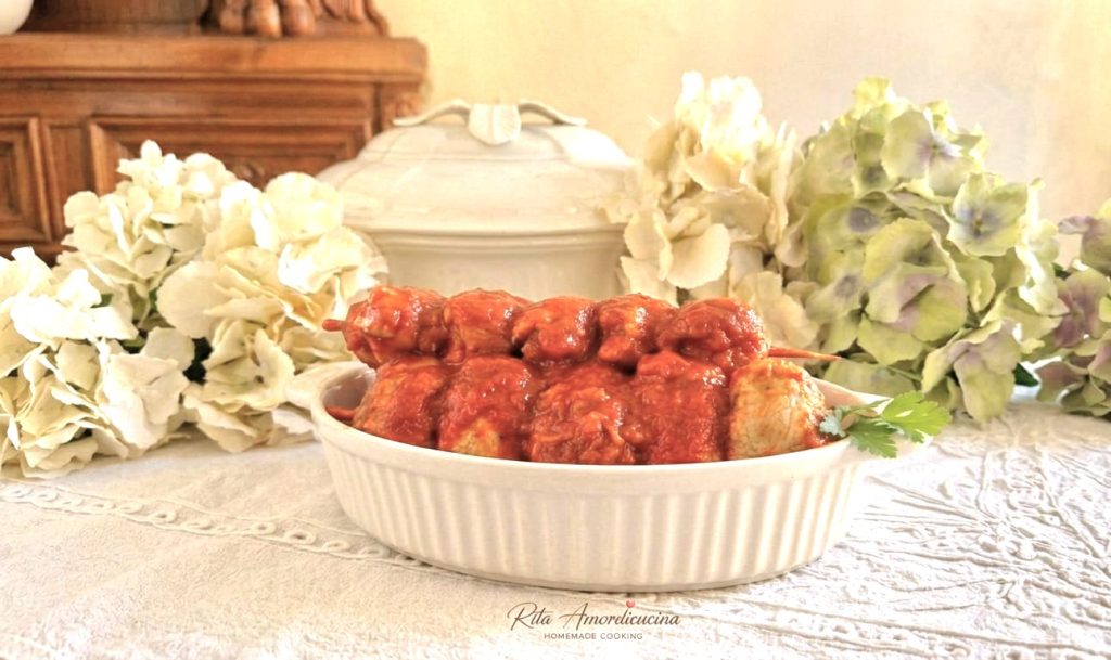 Lonzenscheibchen nach messinesischer Art in Tomatensoße