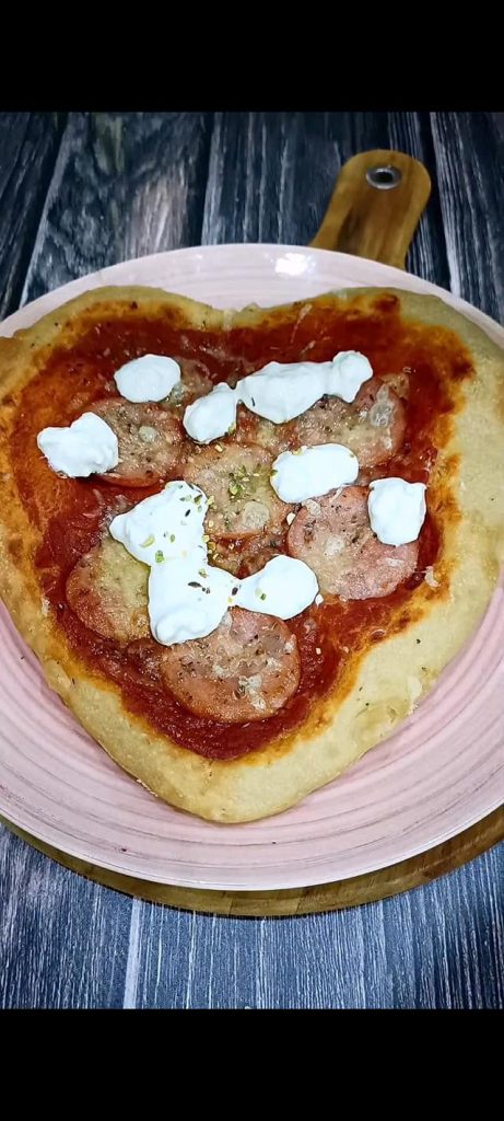 Enfin, ajoutez de la stracciatella et des éclats de pistaches