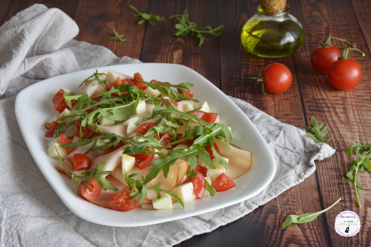 Escalope de dinde avec roquette fromage et tomates cerises